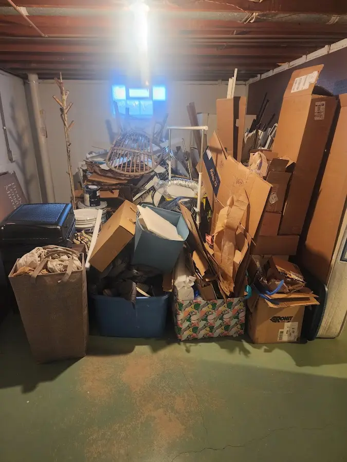 Roll-off dumpster container at job site for 20 Yard Dumpster Rental in Greene